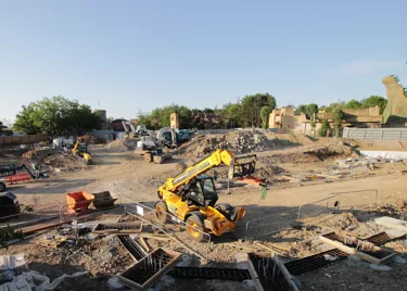July Construction Update for PAW Patrol at Chessington: machinery concreting for the new coaster ride foundating and installing drainage