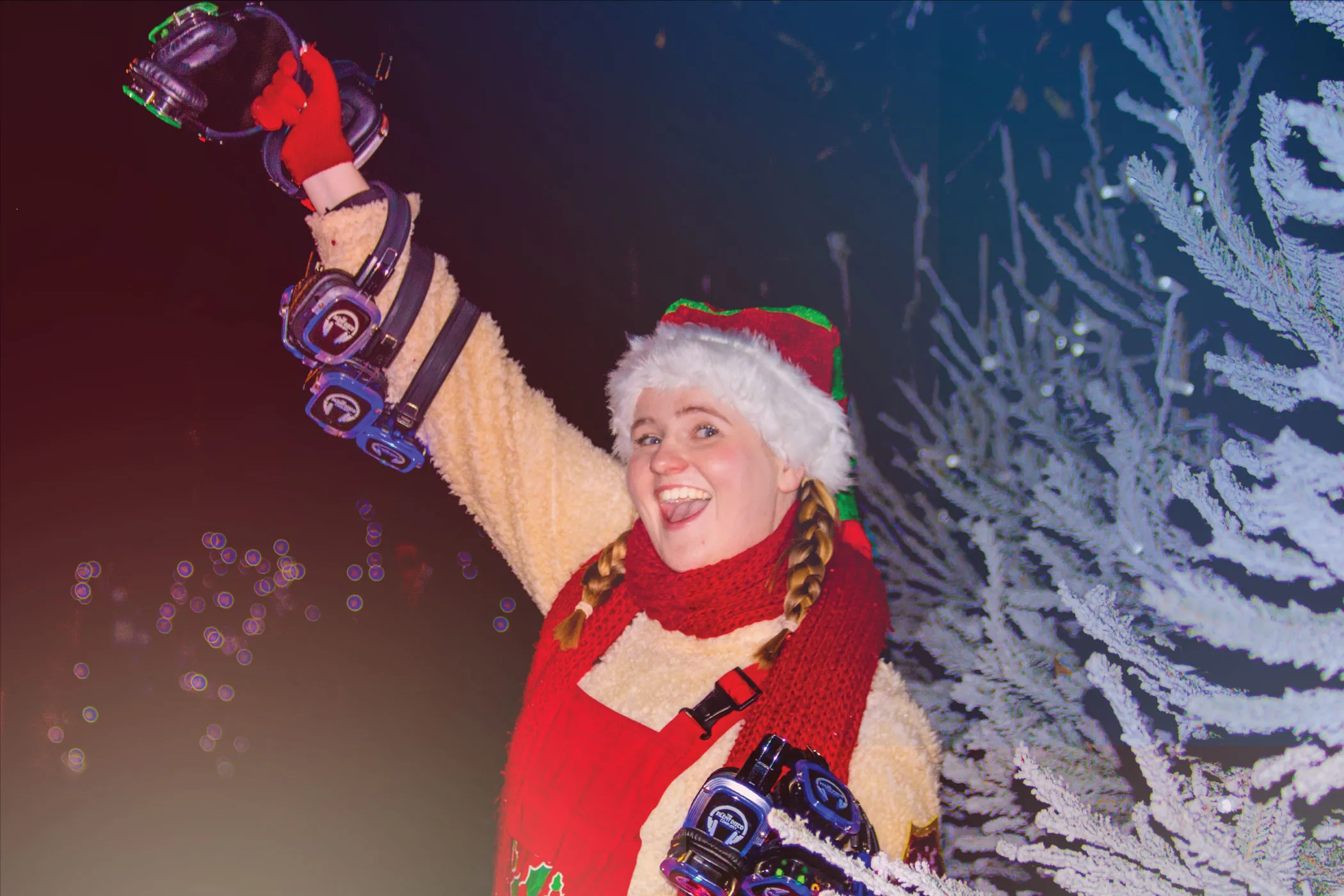 Elf holding silent disco headphones at Chessington World of Adventures Resort