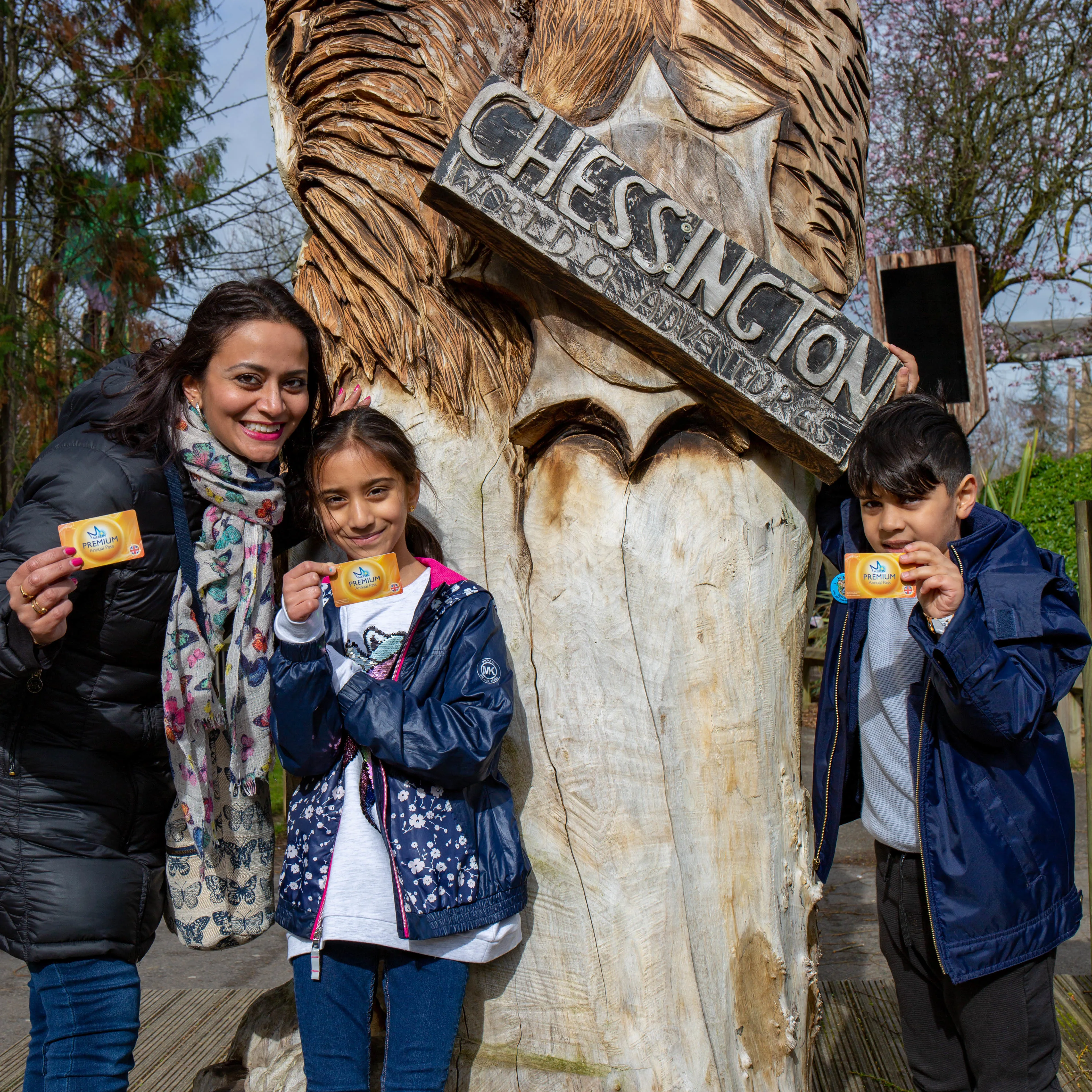 Family showing their Premium Merlin Annual Passes 