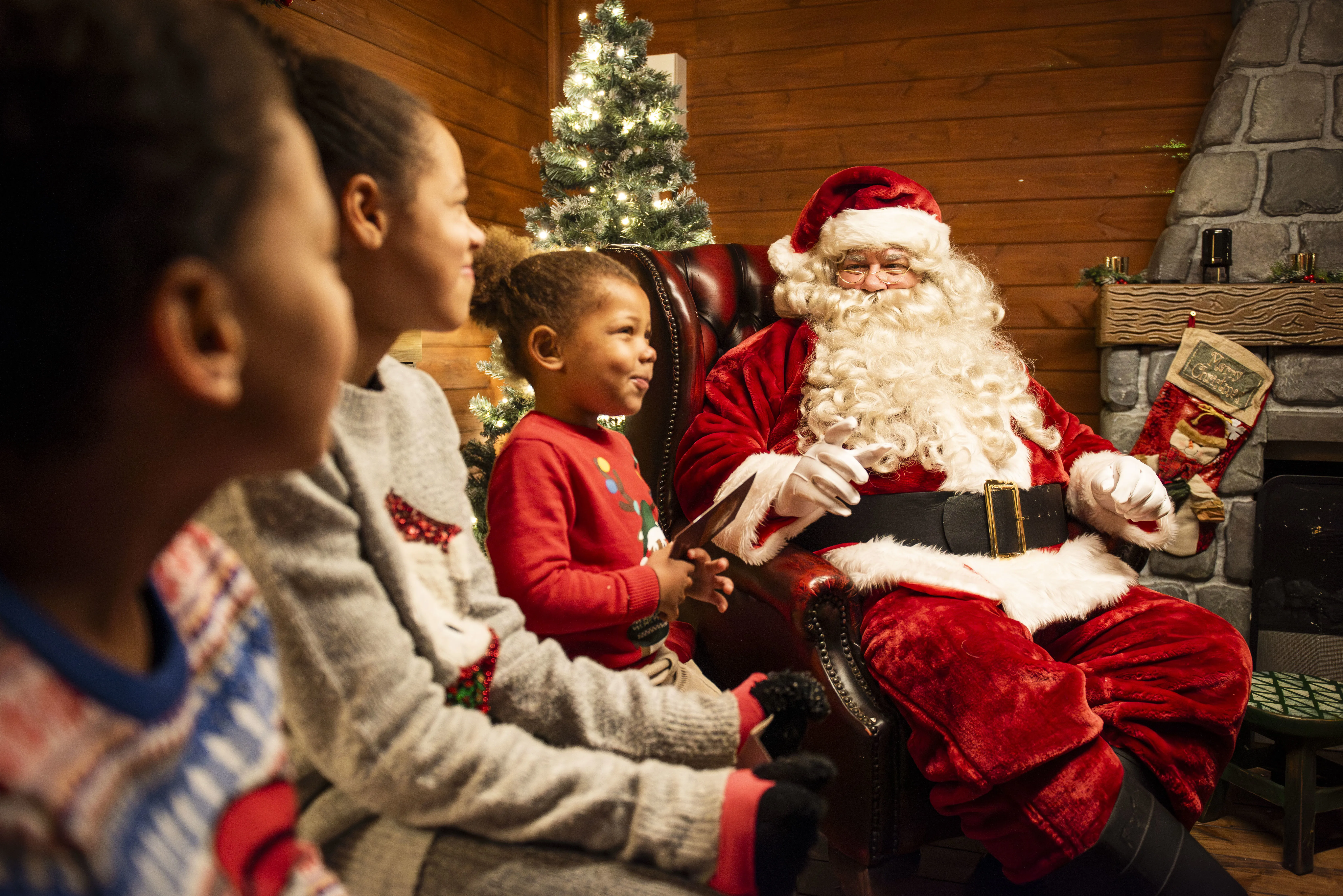 Children meeting Father Christmas in Chessington's Christmas Village