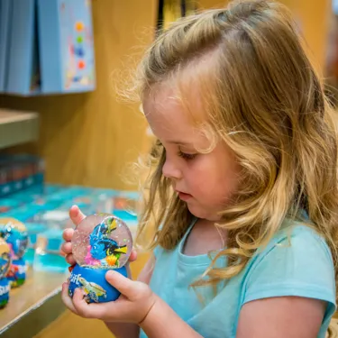 Young girl inside a shop