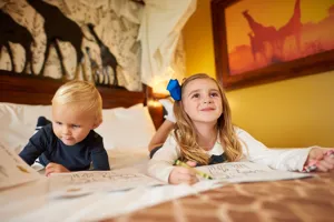 A Giraffe Room In The Chessington Safari Hotel - children reading book